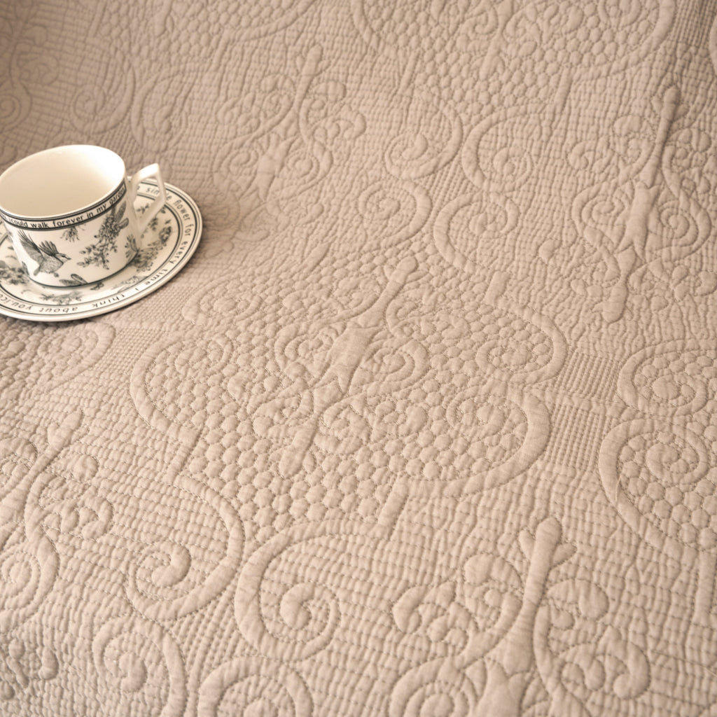 DaDa Bedding Elegant Fringed Cotton Quilted Throw Blanket - Luxurious Solid Soft Paisley Pattern, Cozy Lightweight Lap Throw, Perfect for Couch or Bed, Neutral Sandy Taupe Tan Beige, 50x60 Inches