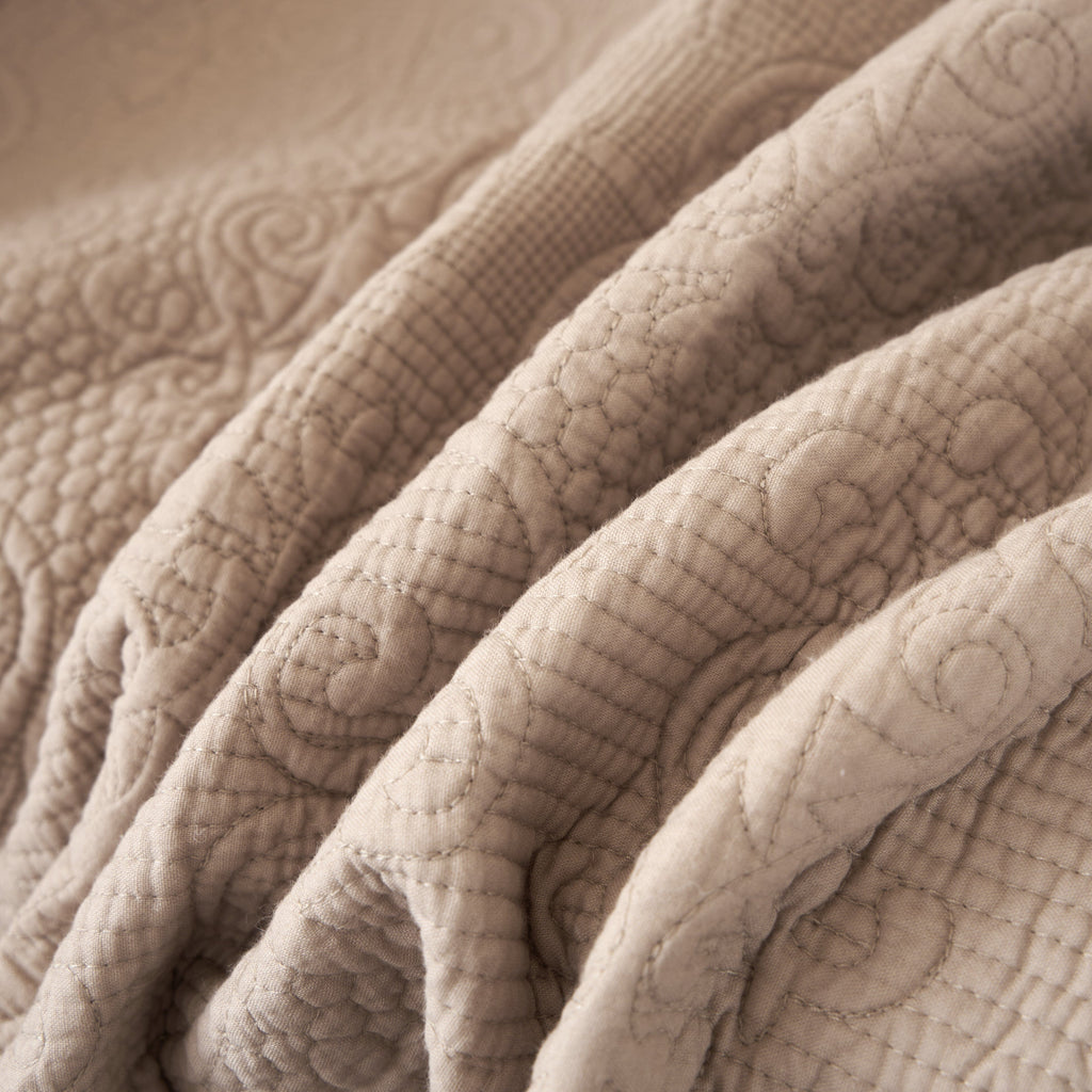 DaDa Bedding Elegant Fringed Cotton Quilted Throw Blanket - Luxurious Solid Soft Paisley Pattern, Cozy Lightweight Lap Throw, Perfect for Couch or Bed, Neutral Sandy Taupe Tan Beige, 50x60 Inches